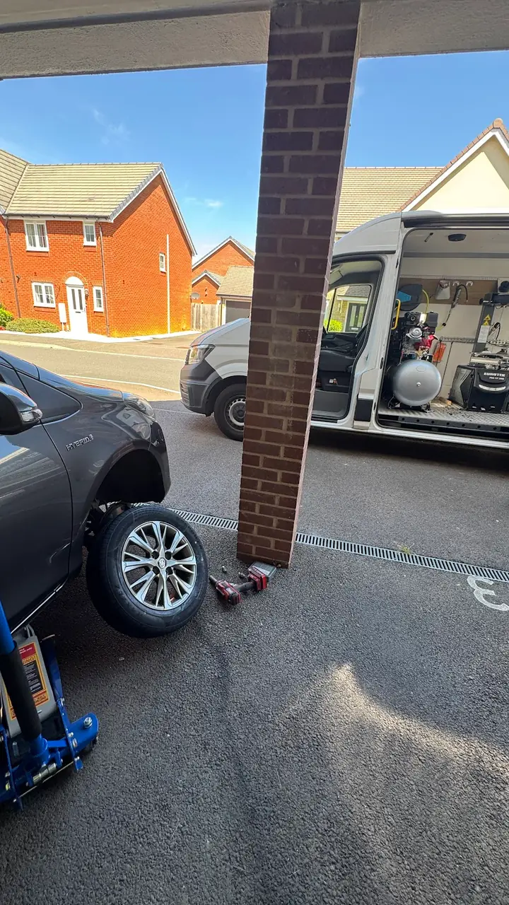 A tyre fitted outside a customer home while they carried on with their day